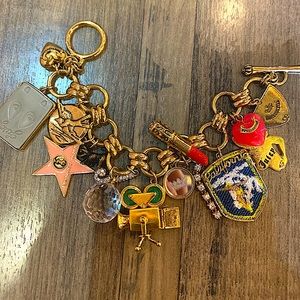 Limited edition authentic Juicy Couture Hollywood Theme bracelet with 15 charms